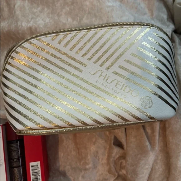 Shiseido Skincare Collection with Gold and Red Accents - Picture 4 of 6